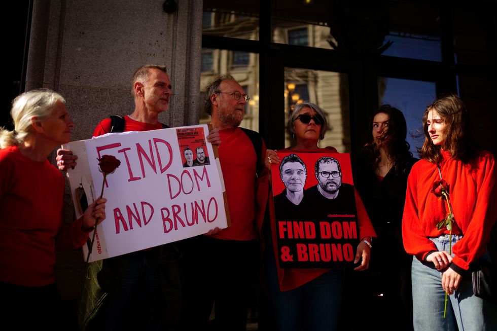 Family of Dom Phillips, (l-r) Sian Phillips, Gareth Phillips, Paul Sherwood, Helen Davies, Rhianna Davies and Domonique Davies, take part in a vigil outside the Brazilian Embassy in London for Phillips, a British journalist, and Bruno Araujo Pereira, an Indigenous affairs official, who are missing in the Amazon