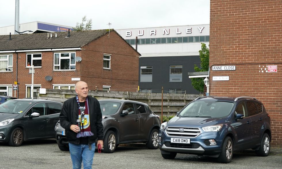 Fans arrive for the Premier League match at Turf Moor, Burnley
