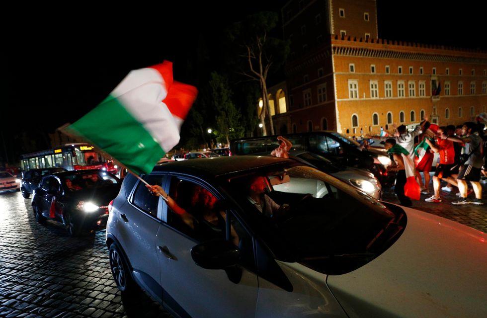 Fans celebrate in Rome as Italy beat Belgium