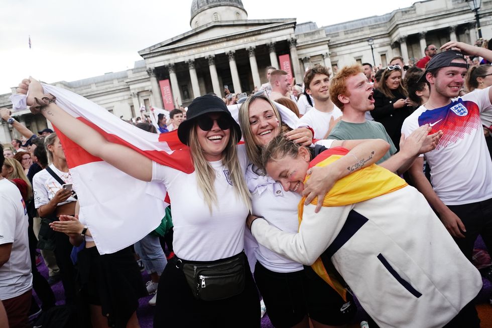 Fans celebrate the final whistle in Trafalgar Square, London, after watching the screening of the UEFA Women's Euro 2022 final held at Wembley Stadium, London. Picture date: Sunday July 31, 2022.