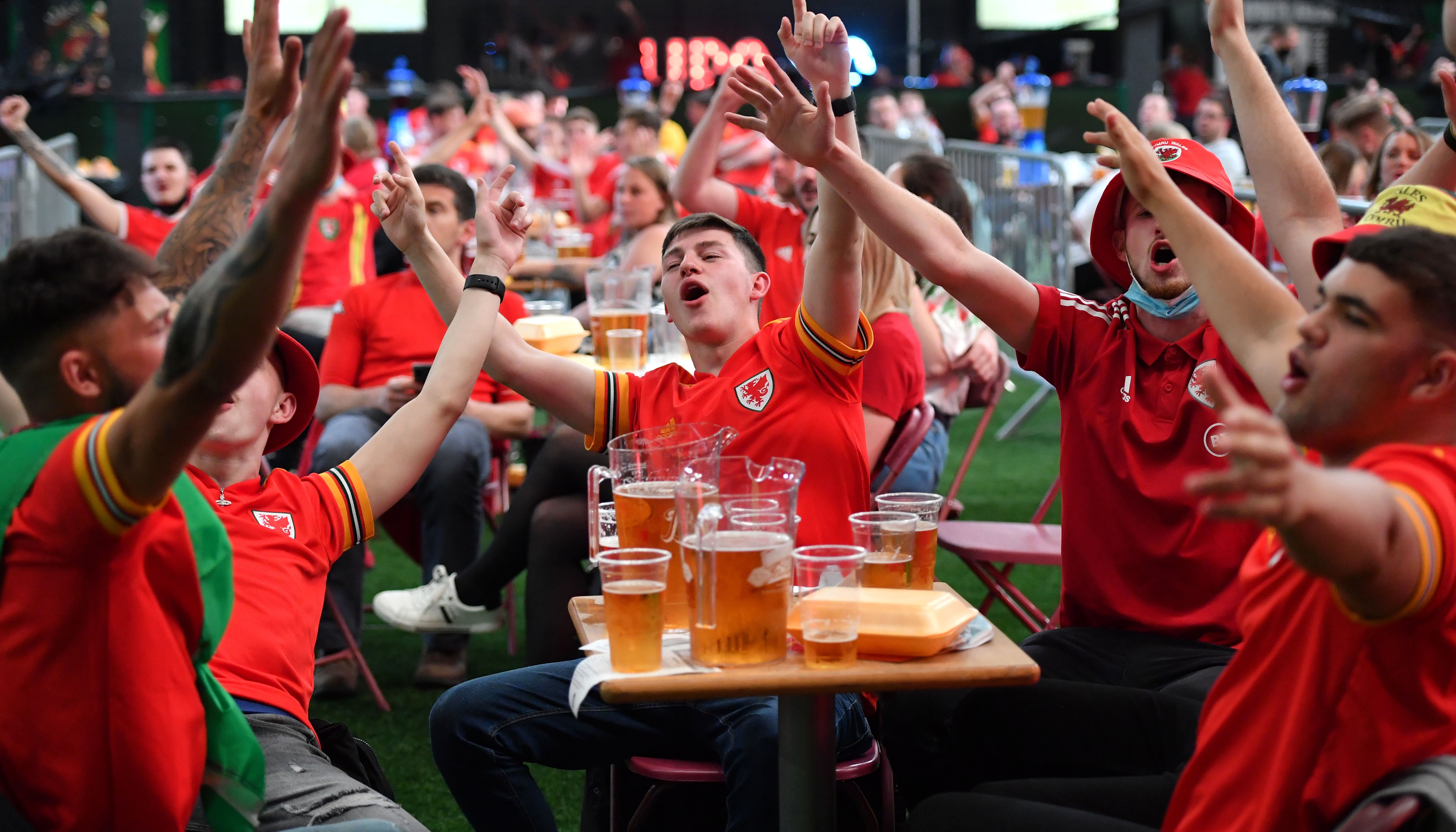 Fans cheered on Wales at Vale Sports Park in Cardiff as they watched the UEFA Euro 2020 round of 16 match between Wales and Denmark.