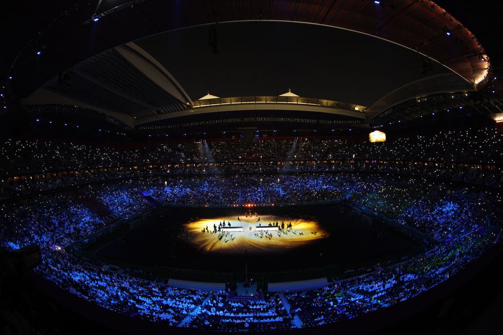 Fans gather at the Al Bayt stadium for the opening game of the Qatar World Cup.