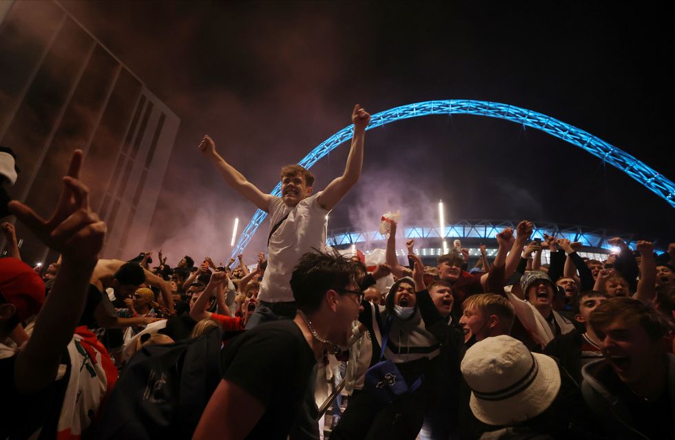 Fans gather for Italy v England at Wembley Stadium, London.