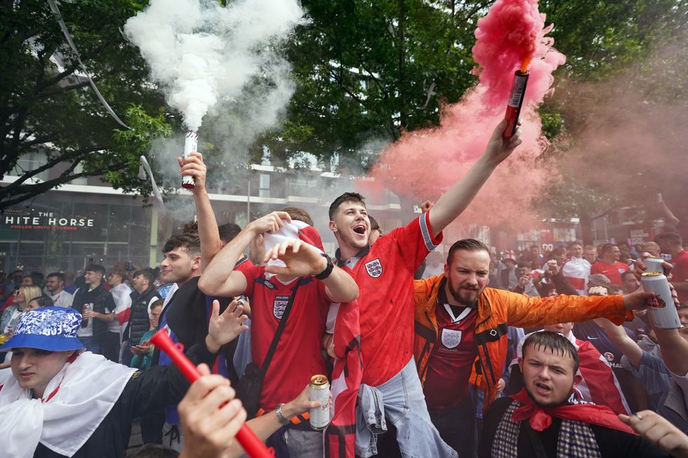 Fans outside Wembley Stadium ahead of the UEFA Euro 2020 semi final match between England and Denmark