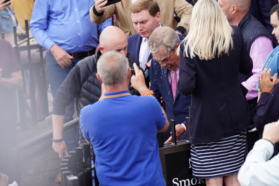 Nigel Farage milkshake attacker DODGES jail after admitting to offence