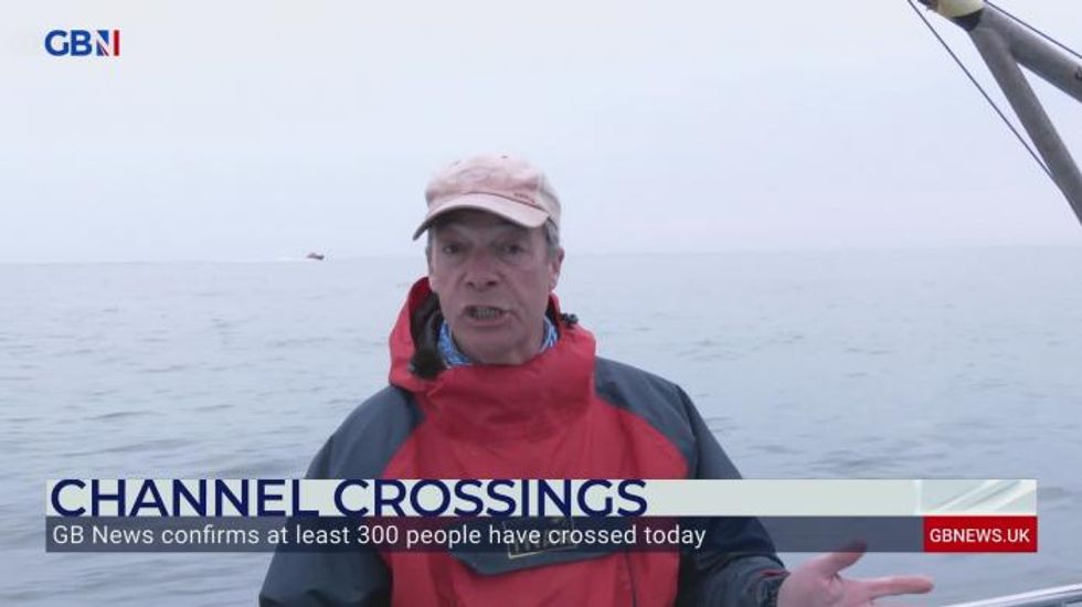 Nigel Farage shares exclusive footage of migrants throwing phones into Channel on day when over 300 people intercepted