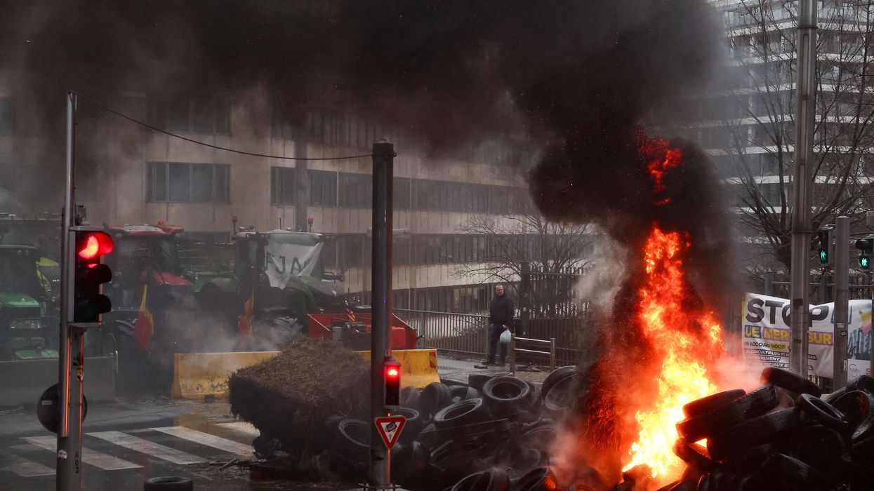 Farmers light tyres ablaze during protest
