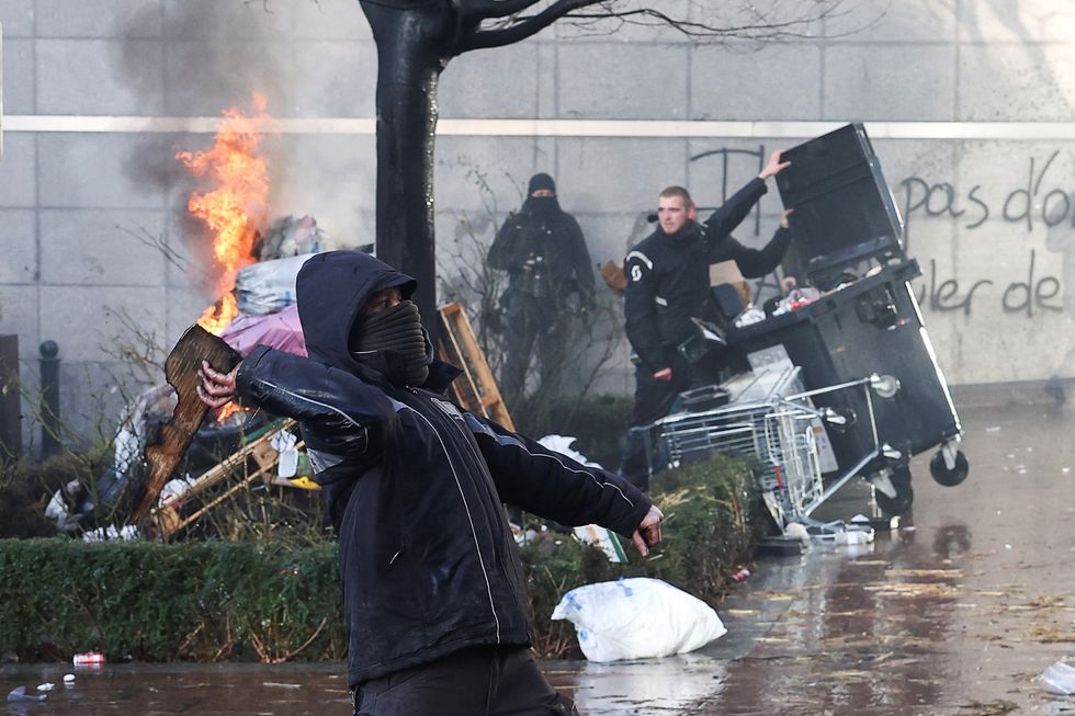 Farmers protest outside the EU Parliament in Brussels