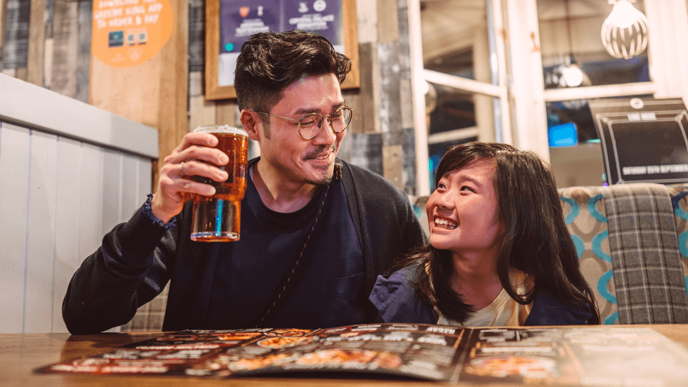 Father and daughter in pub