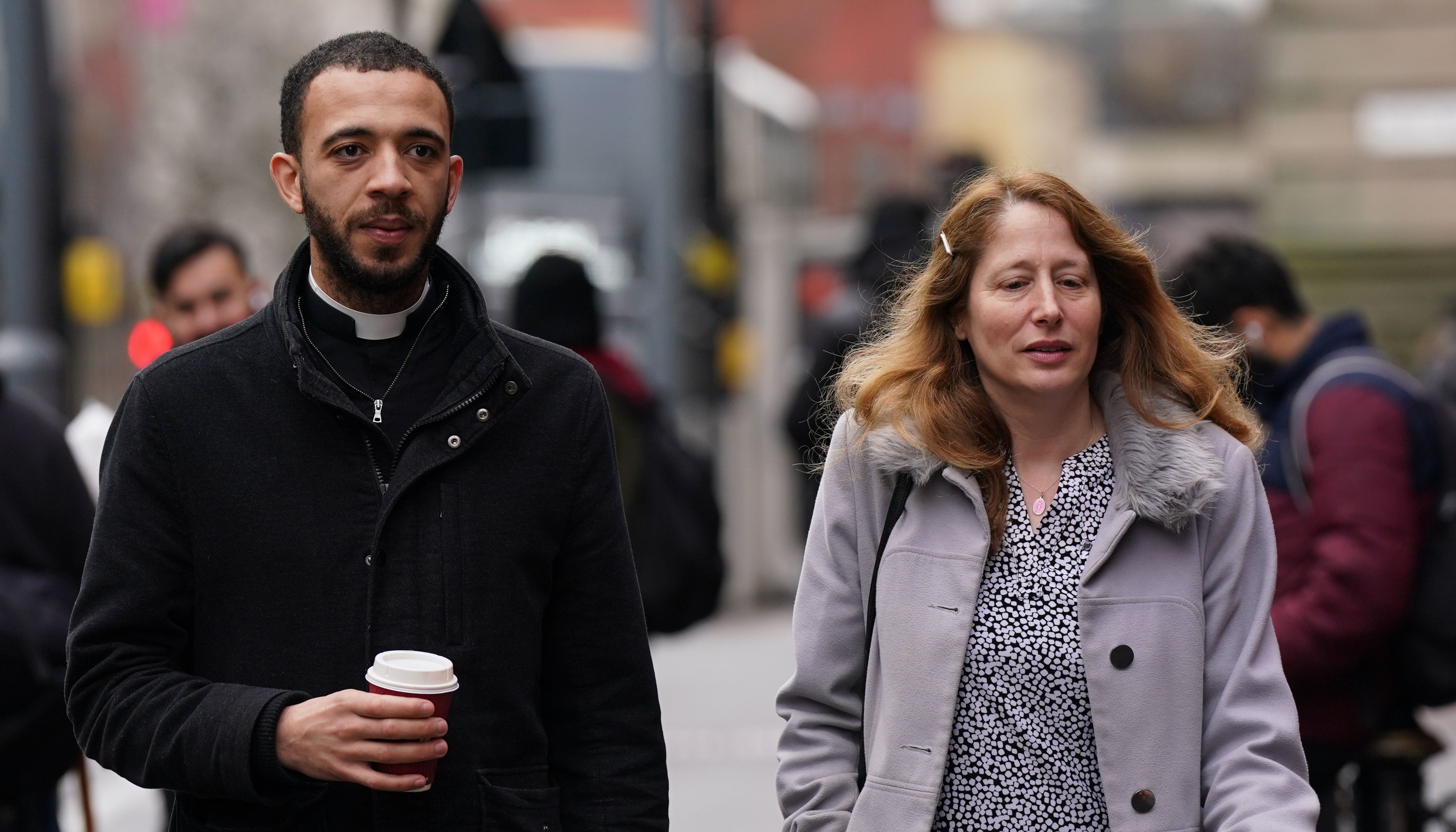 Father Sean Gough, a Catholic priest of the Archdiocese of Birmingham, and Isabel Vaughan-Spruce arriving at Birmingham Magistrates' Court where they are accused of protesting outside an abortion clinic inside a Birmingham abortion facility censorship zone. Picture date: Thursday February 16, 2023.