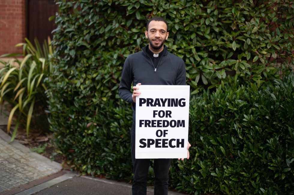 Father Sean Gough was 'supporting free speech' and silently praying outside a closed abortion clinic