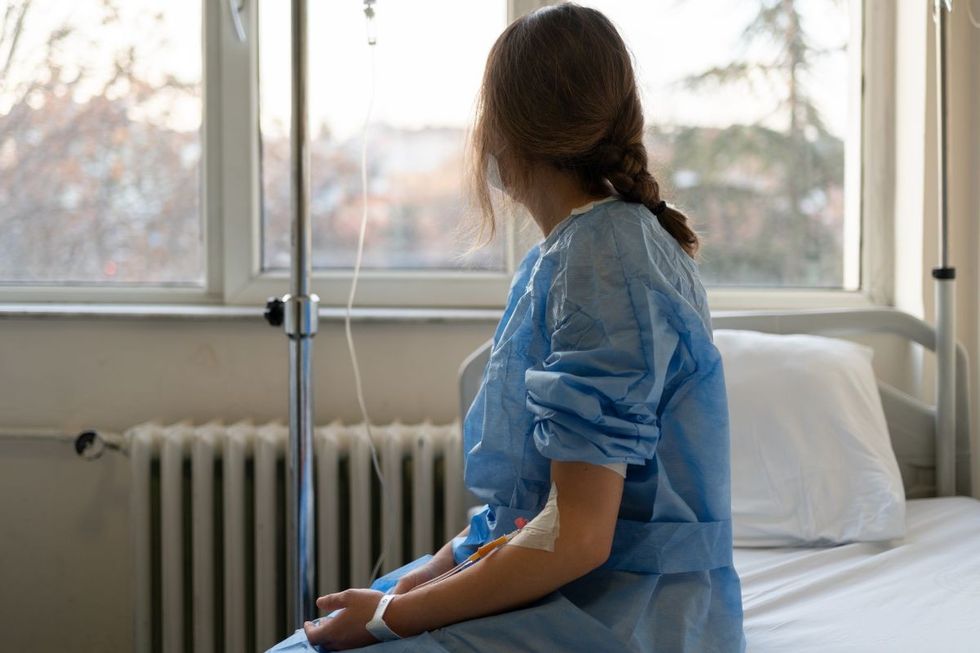 FEMALE CANCER PATIENT STOCK IMAGE