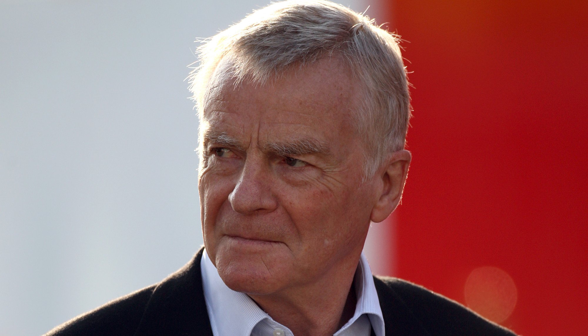 FIA President Max Moseley arrives in the paddock for first practice at the Monza Circuit, Italy.