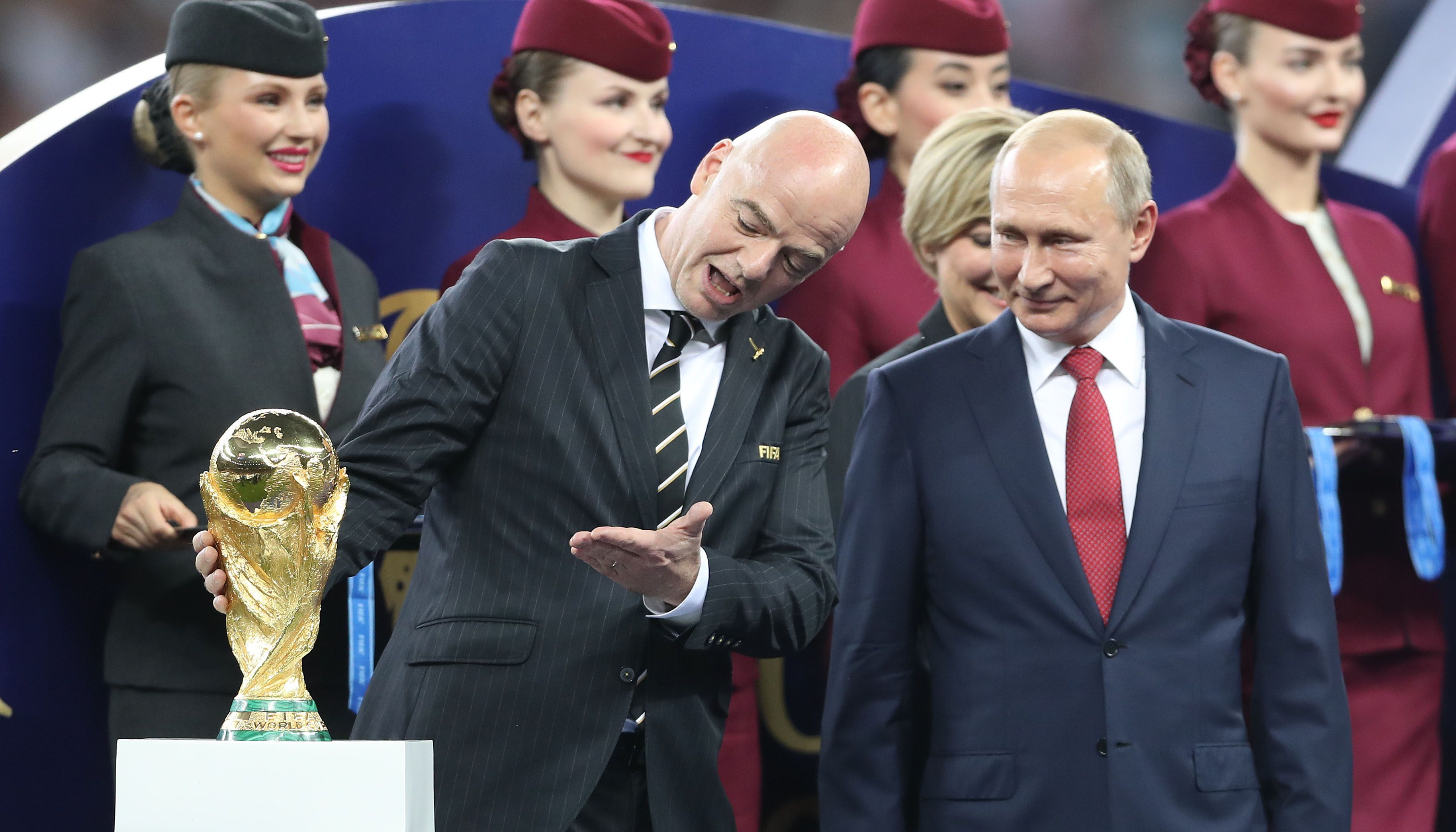 FIFA President Gianni Infantino (left) and Russian President Vladimir Putin with the World Cup trophy prior to the start of the trophy presentation after the FIFA World Cup Final at the Luzhniki Stadium, Moscow.