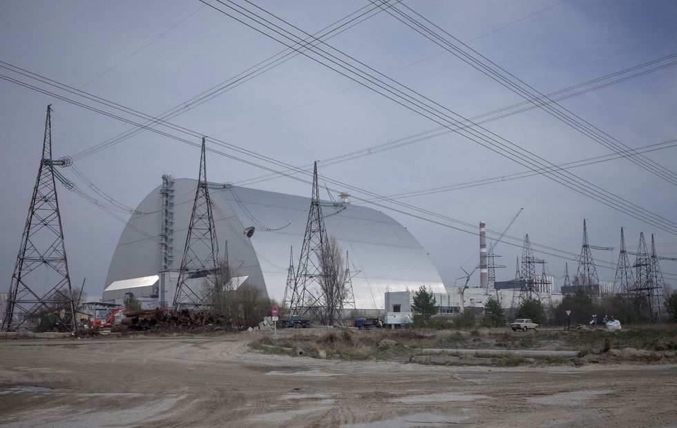FILE PHOTO: A general view shows a New Safe Confinement (NSC) structure over the old sarcophagus covering the damaged fourth reactor at the Chernobyl nuclear power plant, in Chernobyl, Ukraine, April 5, 2017. REUTERS/Gleb Garanich/File Photo/File Photo
