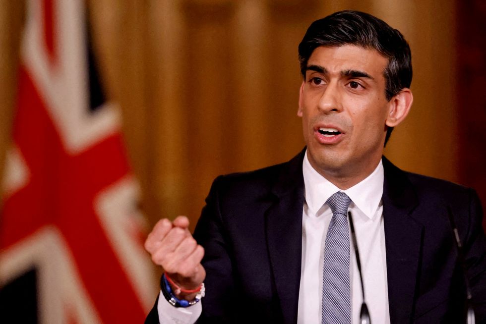 FILE PHOTO: Britain's Chancellor of the Exchequer Rishi Sunak attends a virtual press conference inside 10 Downing Street in central London, Britain March 3, 2021. Tolga Akmen/Pool via REUTERS/File Photo