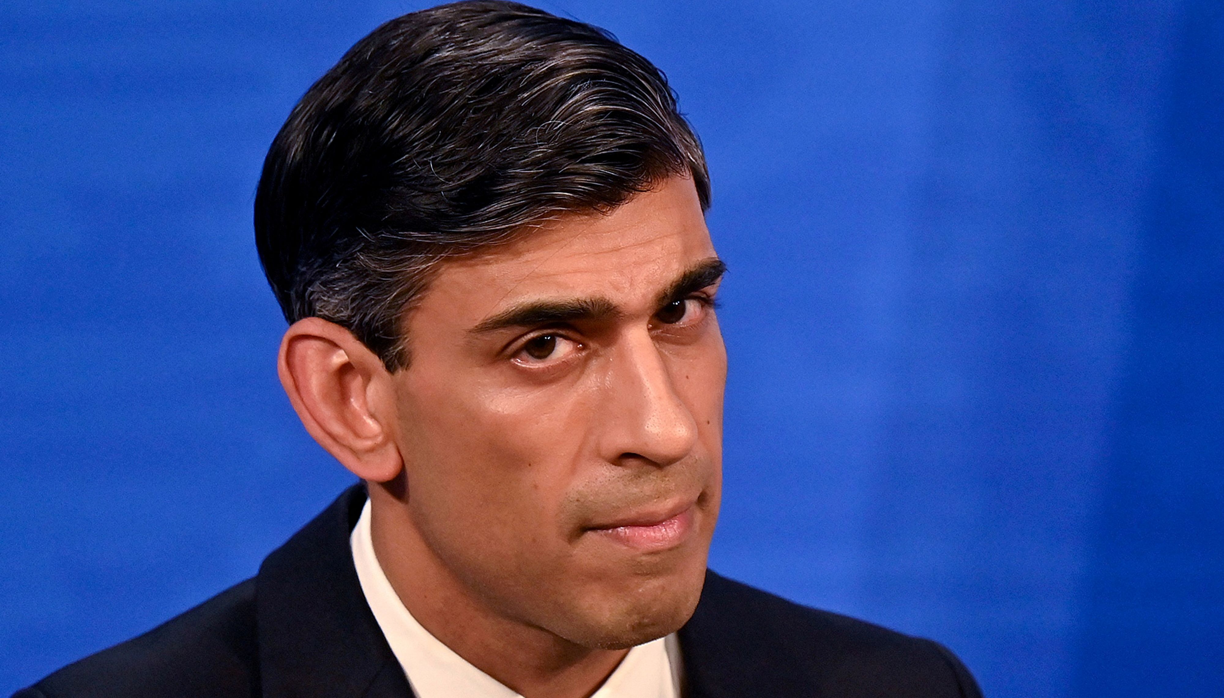 FILE PHOTO: Britain's Chancellor of the Exchequer Rishi Sunak hosts a news conference in the Downing Street Briefing Room in London, Britain February 3, 2022. Justin Tallis/Pool via REUTERS/File Photo