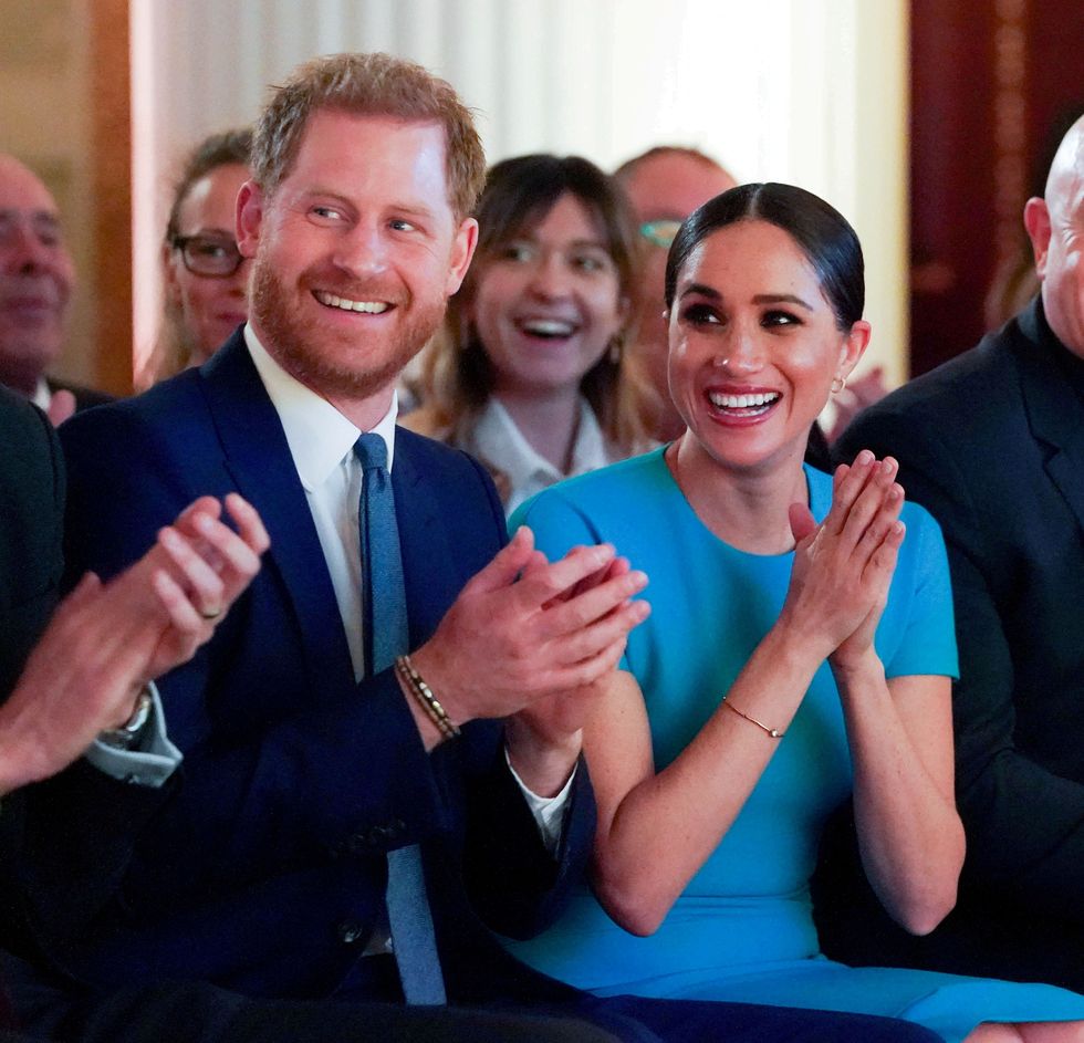 FILE PHOTO: Britain's Prince Harry and his wife Meghan, Duchess of Sussex, cheer during the annual Endeavour Fund Awards at Mansion House in London, Britain March 5, 2020. Paul Edwards/Pool via REUTERS//File Photo