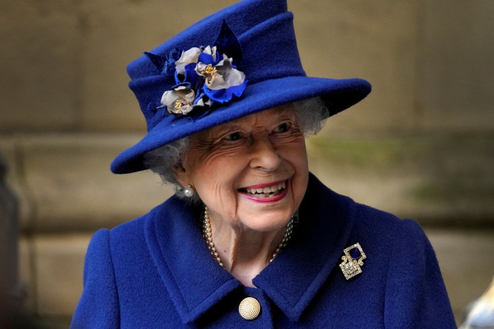 FILE PHOTO: Britain's Queen Elizabeth leaves after a Service of Thanksgiving to mark the Centenary of the Royal British Legion at Westminster Abbey, London, Britain October 12, 2021. Frank Augstein/Pool via REUTERS/File Photo