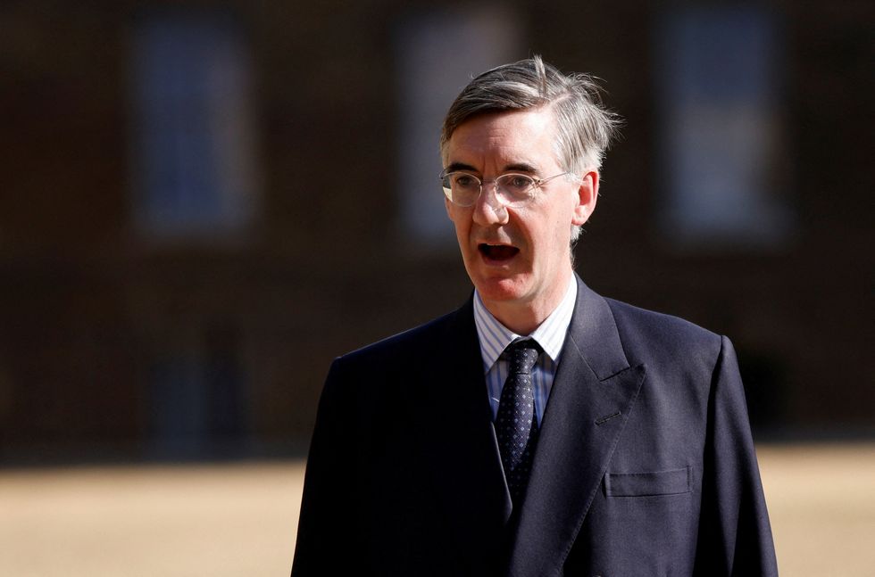 FILE PHOTO: British Minister for Brexit Opportunities and Government Efficiency Jacob Rees-Mogg walks in London, Britain, July 18, 2022. REUTERS/John Sibley/File Photo