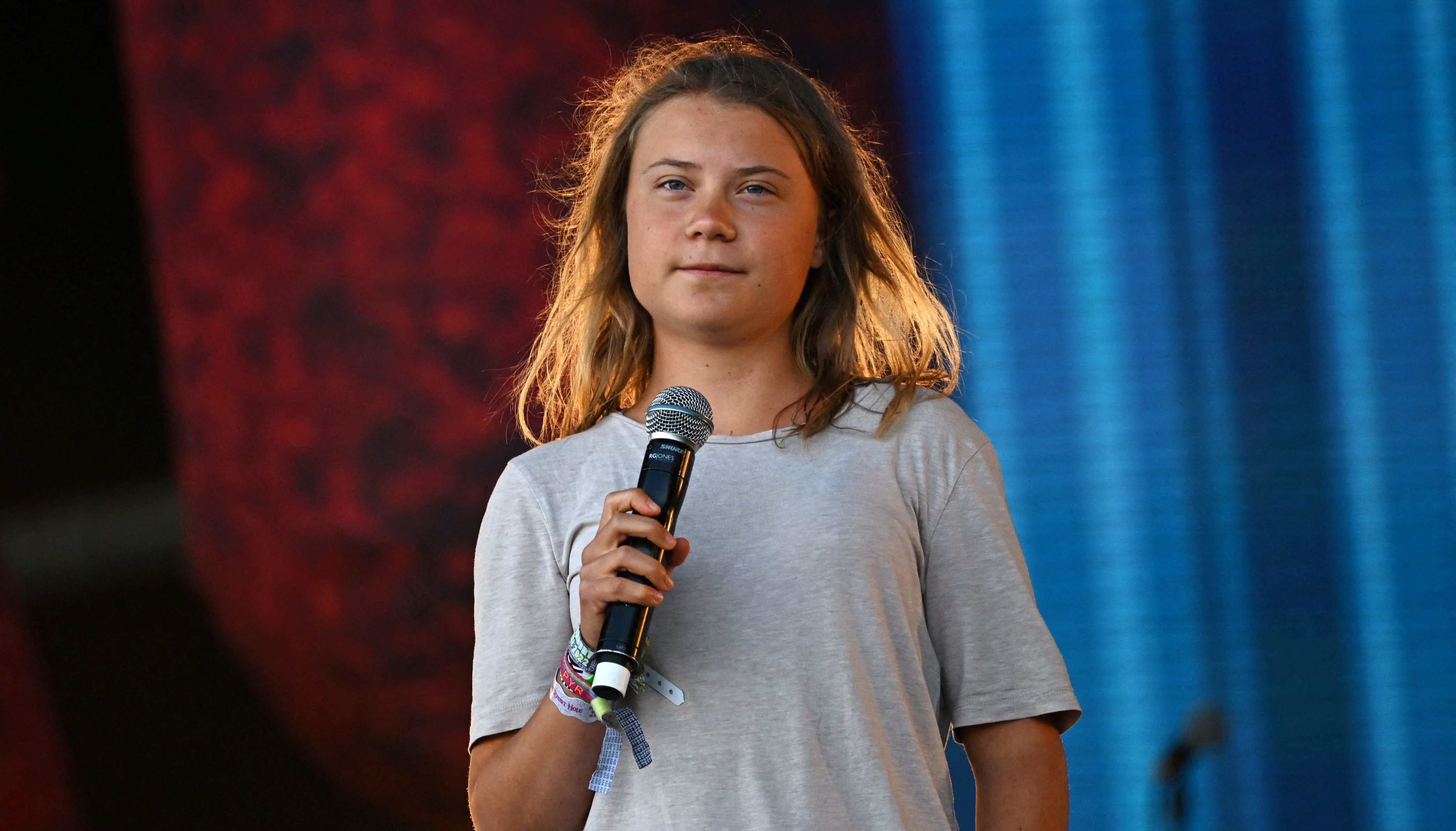 FILE PHOTO: Climate activist Greta Thunberg speaks on the Pyramid stage at Worthy Farm in Somerset during the Glastonbury Festival in Britain, June 25, 2022. REUTERS/Dylan Martinez/File Photo