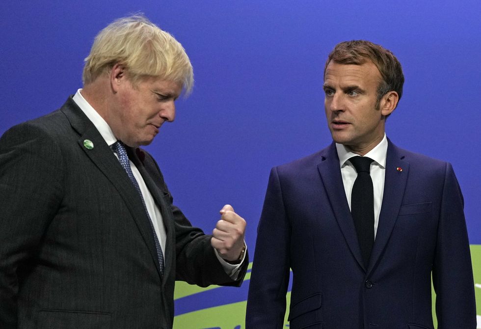 File photo dated 01/11/21 of Prime Minister Boris Johnson (left) along side French President Emmanuel Macron. The French president branded Boris Johnson a %22clown%22 and a %22knucklehead%22 a Government minister has said. Issue date: Thursday December 2, 2021.