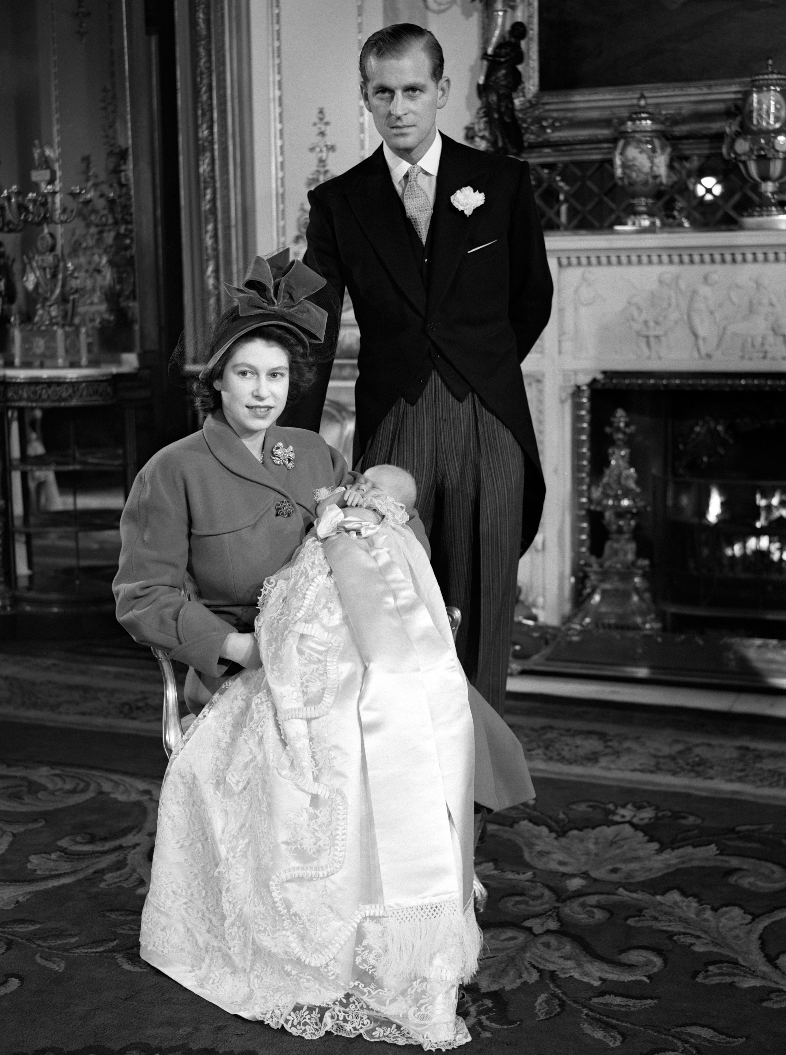 File photo dated 01/12/48 of the Duke of Edinburgh with Queen Elizabeth II holding Prince Charles in his christening gown. Issue date: Thursday September 8, 2022.