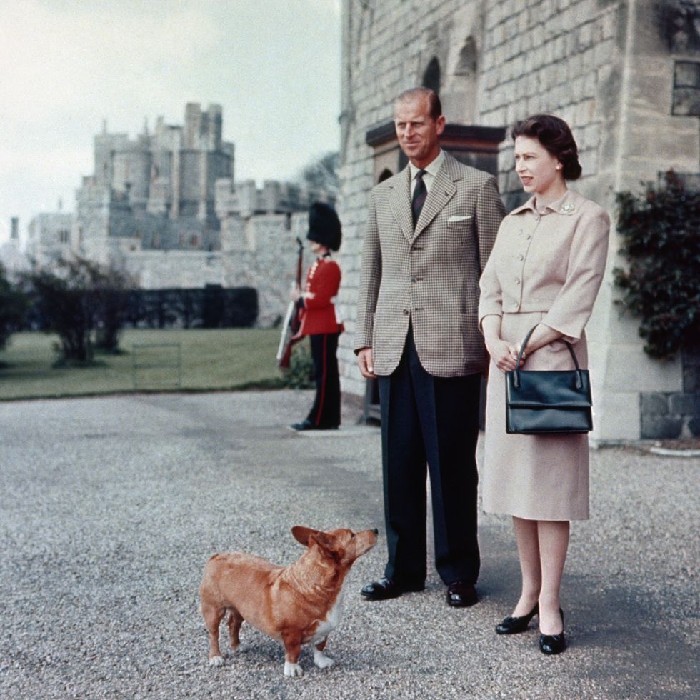 File photo dated 02/06/1959 of Queen Elizabeth II and Duke of Edinburgh at Windsor joined by Sugar, one of the Royal corgis. Issue date: Sunday January 30, 2022.