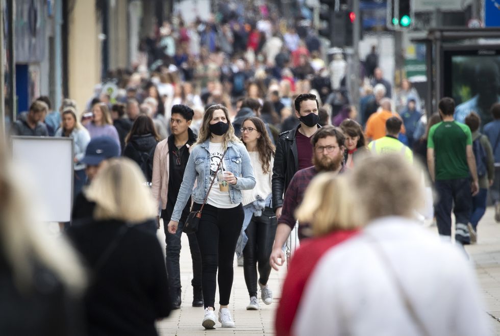 File photo dated 02/07/20 of shoppers in Princes Street, Edinburgh. The number of people going into shops in Scotland has increased for the first time since before the pandemic hit almost two years ago, according to figures from the Scottish Retail Consortium (SRC). Issue date: Friday February 4, 2022.