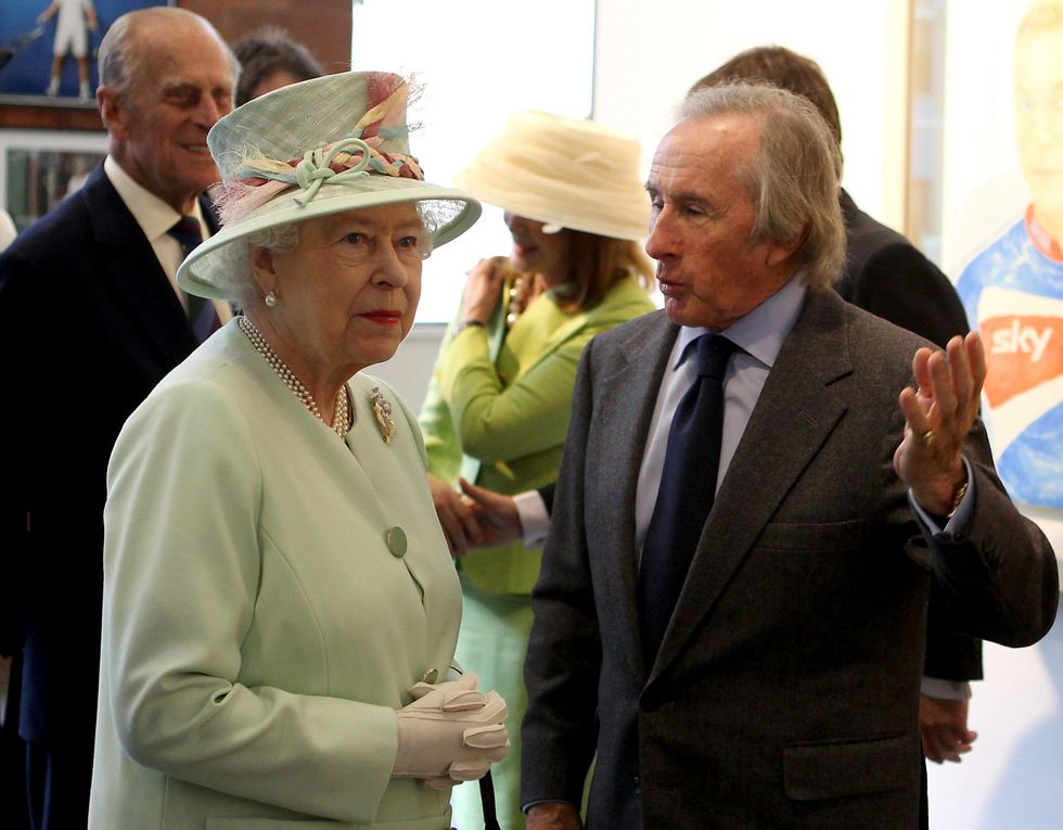 File photo dated 02-07-2012 of Queen Elizabeth II speaking with Sir Jackie Stewart. Former Formula One world champion Sir Jackie Stewart has paid tribute to his wonderful, extraordinary friend, the Queen. Issue date: Tuesday September 13, 2022.