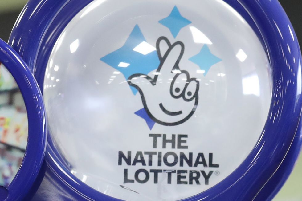 File photo dated 02/08/18 of a National Lottery sign, as operator Camelot has announced it will increase the prize pots for its Lotto game after a slump in ticket sales.