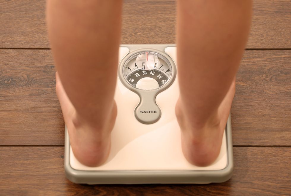 File photo dated 03/03/14 of an 11-year-old girl using a set of weighing scales. Projects working to tackle childhood obesity have been awarded more than 750,000 of cash from the Scottish Government. Issue date: Saturday December 4, 2021.
