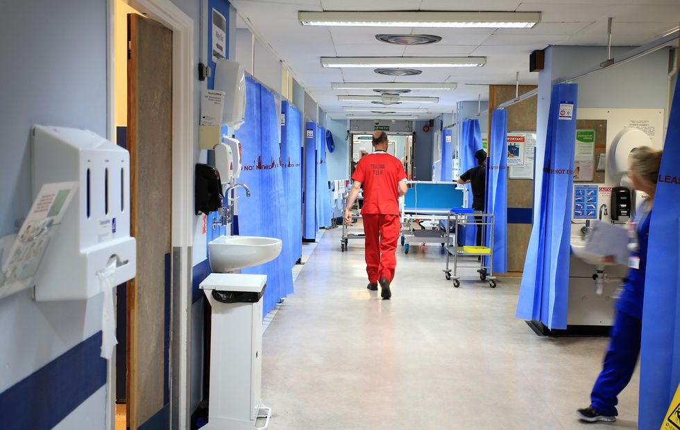 File photo dated 03/10/14 of a hospital ward, as leading doctors have warned that the NHS is %22in danger of complete collapse%22 after a poll revealed that more than two in five of the most senior hospital medics are planning to leave the NHS in the next year.