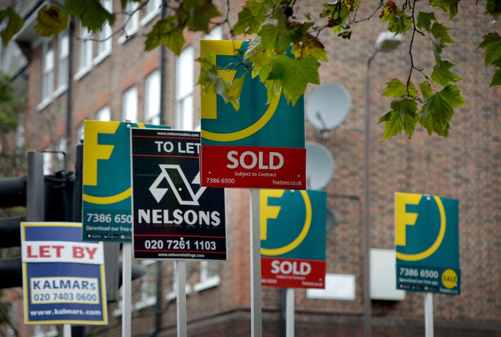File photo dated 05/10/15 of letting and for sale signs outside flats, as first-time buyer mortgage payments are close to levels seen around the run-up to the financial crisis, in terms of the proportion of take-home pay being swallowed up by the home loan, according to a building society.