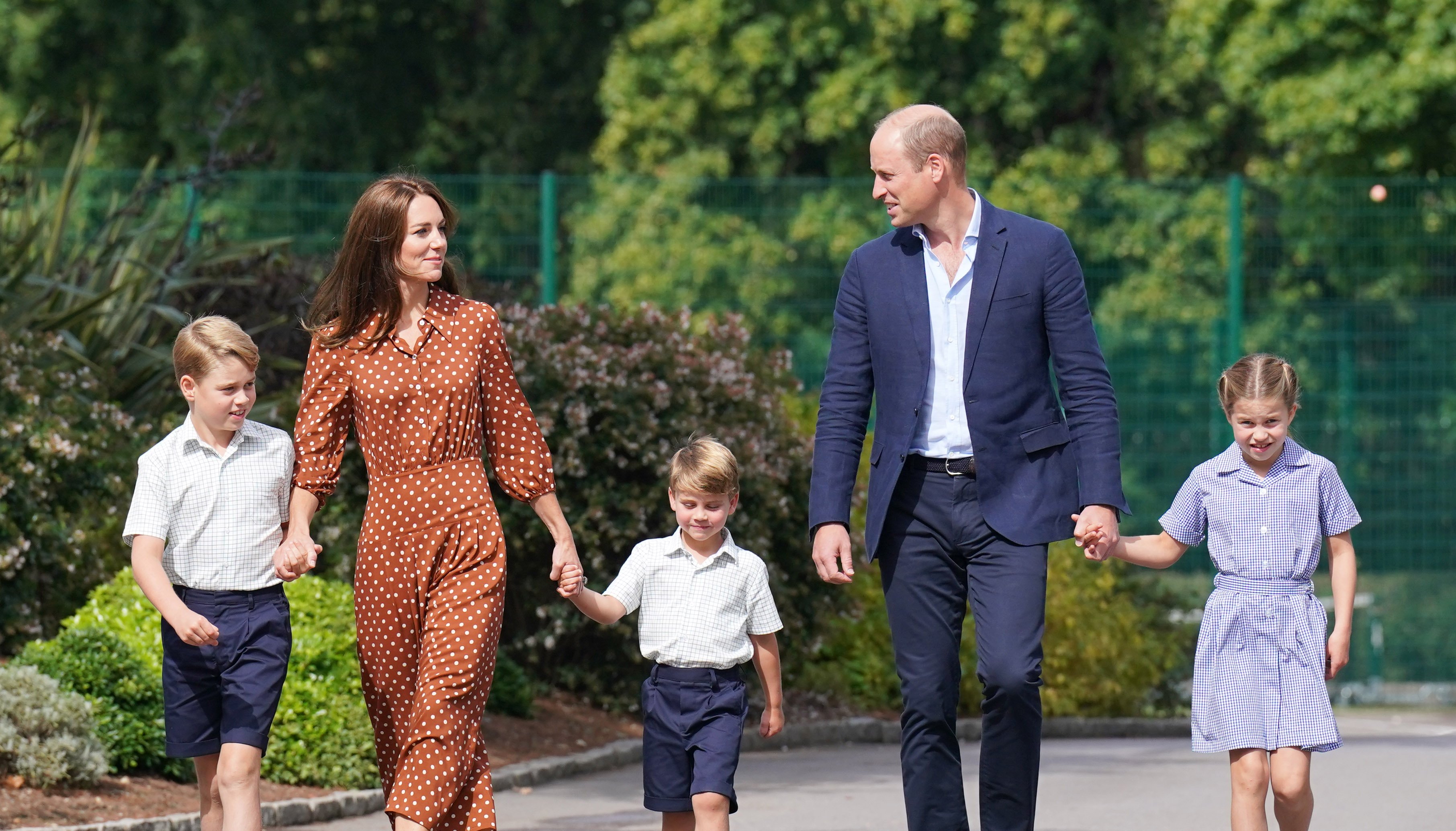 File photo dated 07/09/22 of Prince George, Princess Charlotte and Prince Louis, accompanied by their parents the then Duke and Duchess of Cambridge (now Prince and Princess of Wales) arrive for a settling in afternoon at Lambrook School, near Ascot in Berkshire. The Princess of Wales is celebrating her 41st birthday just one day before the Duke of Sussex's controversial memoir hits shelves. Issue date: Sunday January 8, 2023.