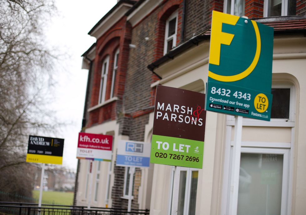 File photo dated 08/02/17 of a row of letting agents signs placed outside houses. The average rental asking price in the UK has jumped to a new record as demand continues to outstrip properties on the market, according to a report.