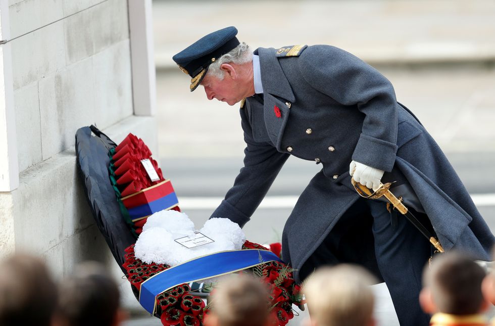 File photo dated 08/11/20 of the then Prince of Wales (now King Charles III) lays a wreath during the Remembrance Sunday service at the Cenotaph, in Whitehall, London. The royal family will be out in force on Sunday for a moving Remembrance Day service - the first since the death of the Queen. The King will lay a new poppy wreath incorporating a ribbon of his racing colours, with the design a tribute to the ones used by both his late mother and his grandfather George VI. Issue date: Thursday November 10, 2022.