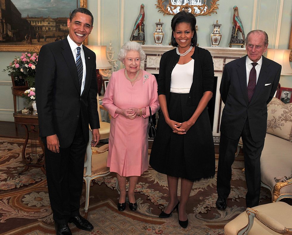 File photo dated 1/4/2009 of US President Barack Obama and his wife, Michelle, talk with Queen Elizabeth II and the Duke of Edinburgh at Buckingham Palace in London. Issue date: Friday September 9, 2022.