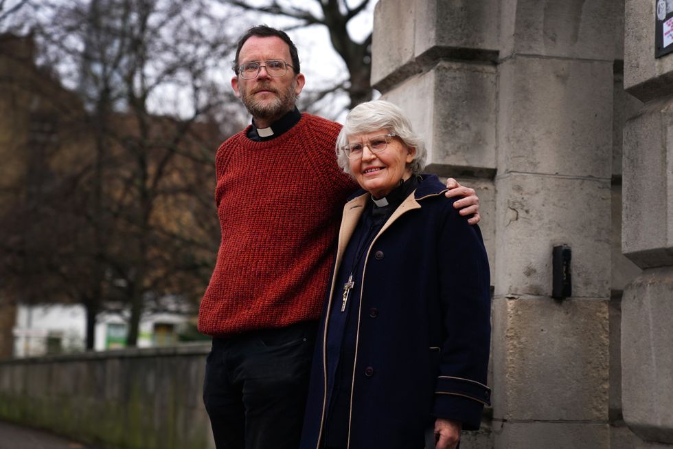 File photo dated 10/01/22 of Extinction Rebellion activists Father Martin Newell and Reverend Sue Parfitt, 79, outside Inner London Crown Court, south east London, where they are on trial over stopping a train at Shadwell station in October 2019.