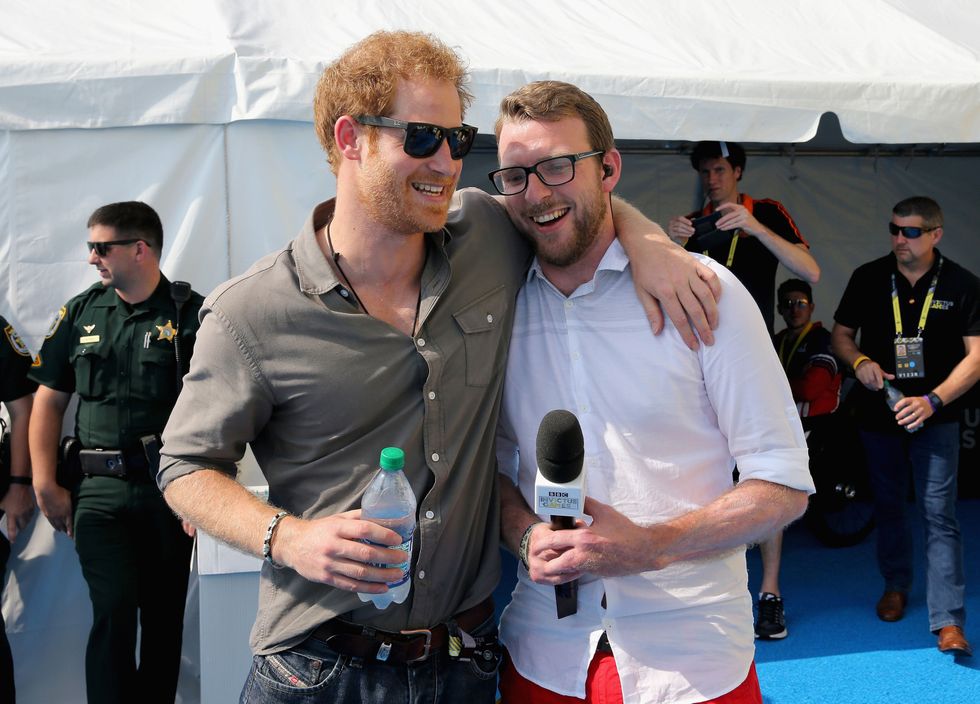 File photo dated 11/05/16 of Prince Harry (left) talking to JJ Chalmers during the Invictus Games 2016 at ESPN Wide World of Sports in Orlando, Florida. Issue date: Monday April 11, 2022.