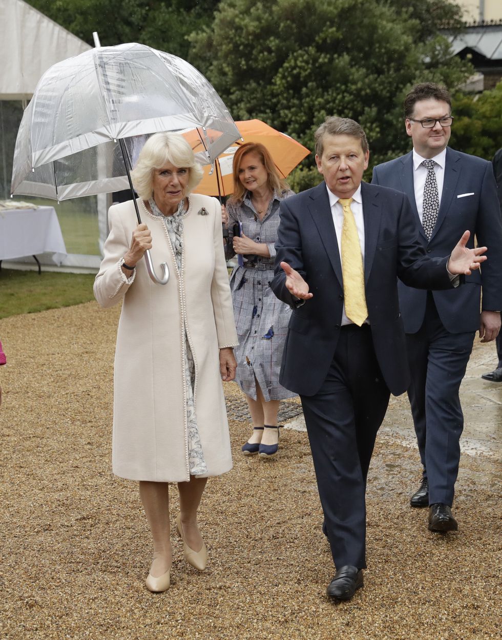 File photo dated 12/6/2019 of the Duchess of Cornwall walks with the event host, the radio and television presenter Bill Turnbull as she attends the Bees for Development biennial Bee Garden Party at Marlborough House, London. Mr Turnbull has died at the age of 66, his family has said. Issue date: Thursday September 1, 2022.