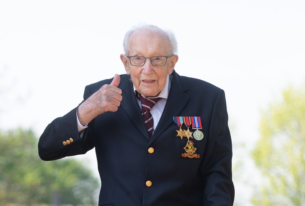 File photo dated 16/04/20 of the then 99-year-old war veteran Captain Tom Moore, at his home in Marston Moretaine, Bedfordshire, after he achieved his goal of 100 laps of his garden. The family of Captain Sir Tom Moore are encouraging people to celebrate his spirit of generosity by taking on their own "Captain Tom 100" charity challenge on what would have been the weekend of his 101st birthday.Issue date: Tuesday April 6, 2021.