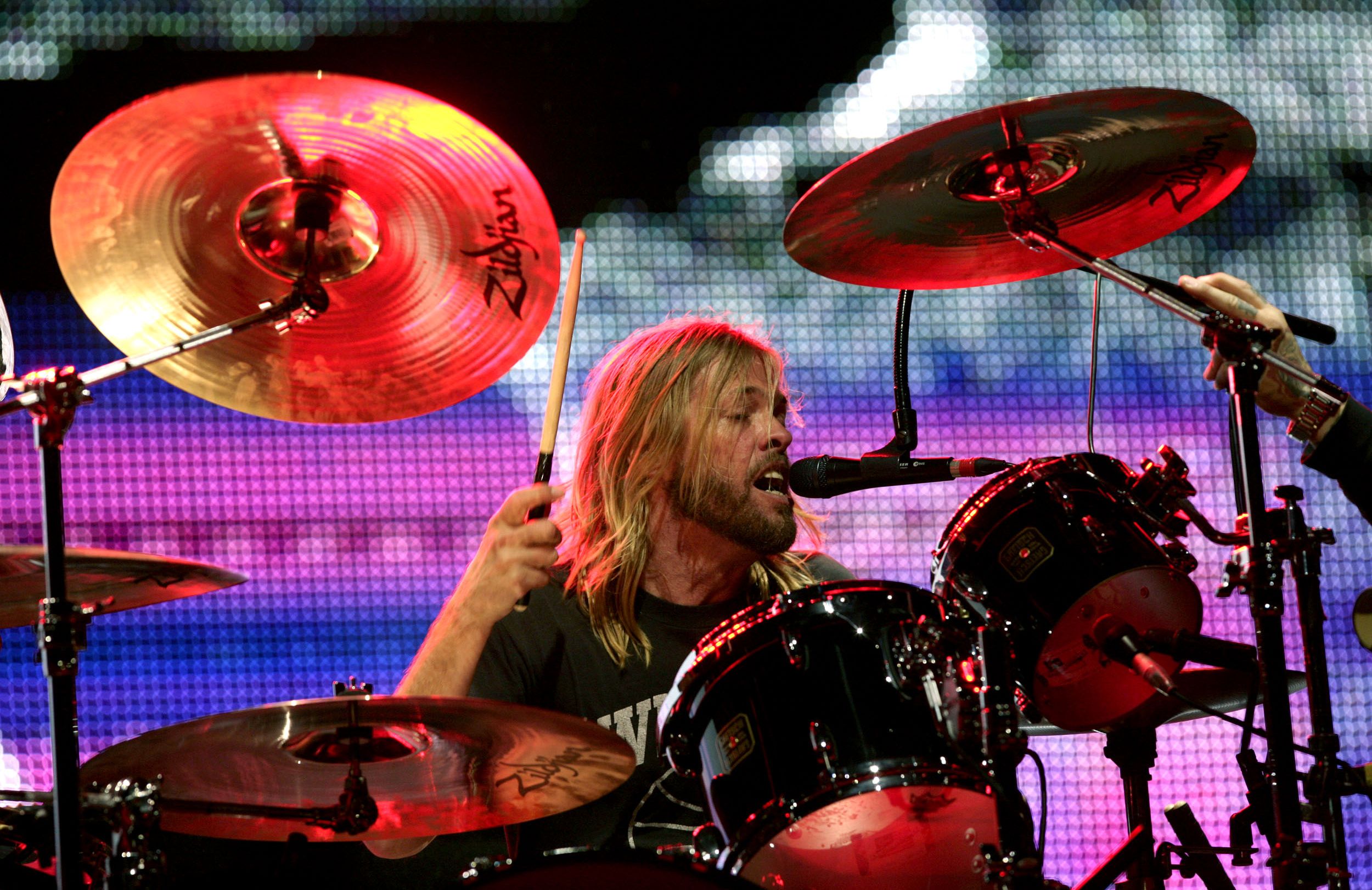 File photo dated 18/08/8 of Taylor Hawkins of the Foo Fighters performing live at the V Festival at Hylands Park in Chelmsford, Essex. Taylor Hawkins, drummer of rock group Foo Fighters has died at the age of 50, the band has announced, saying it was %22devastated by the untimely loss%22 and asked for the privacy of his family to be respected. Issue date: Saturday March 26, 2022.