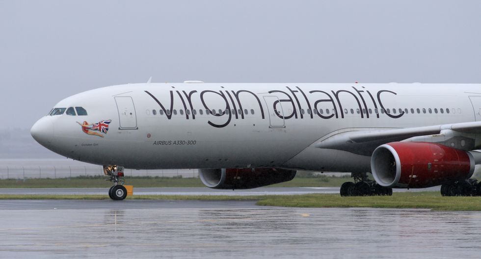 File photo dated 19/05/16 of a Virgin Atlantic aircraft lands at Liverpool John Lennon Airport. A Virgin Atlantic aircraft turned back to Heathrow after it emerged the first officer had not completed his final flying test. Issue date: Thursday May 5, 2022.