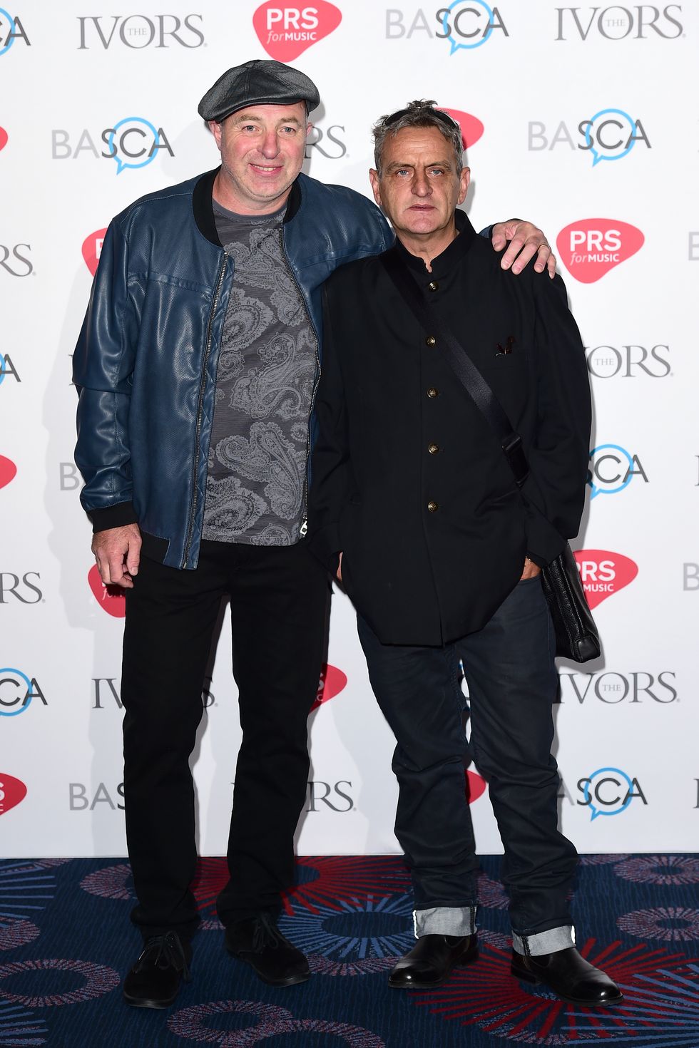 File photo dated 19/05/16 of Mark Day and Paul Ryder (right) of The Happy Mondays attending the 61st Annual Ivor Novello Music Awards. Paul Ryder, bass player and founding member of the Happy Mondays, has died aged 58, the band has announced. Issue date: Friday July 15, 2022.