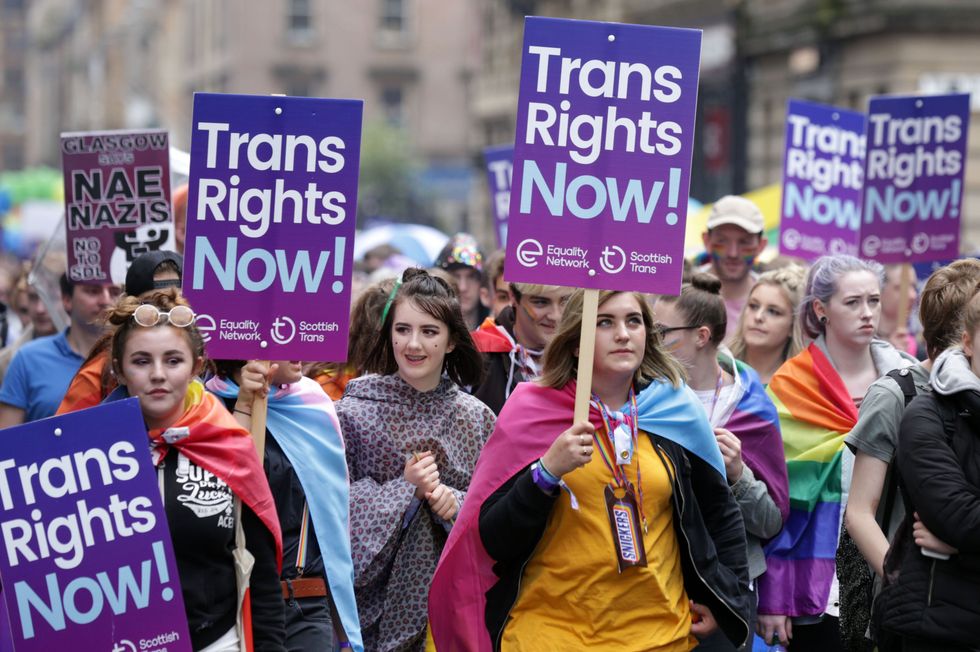 File photo dated 19/08/17 of people carrying Trans rights banners taking part in the Pride Glasgow parade. Issue date: Friday February 11, 2022.