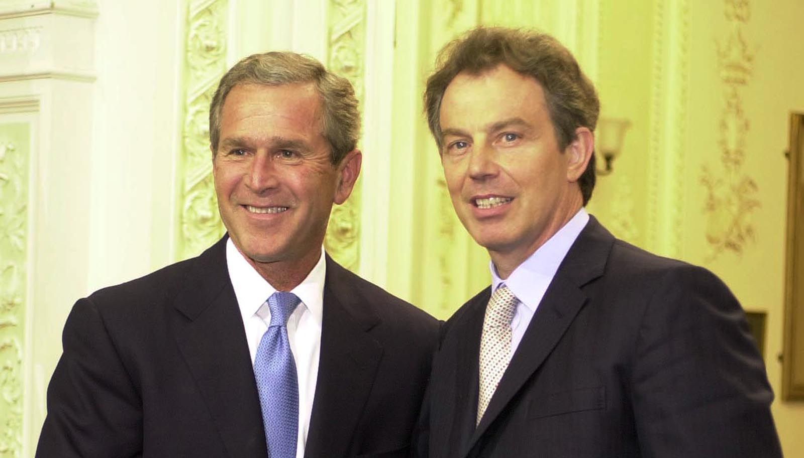 File photo dated 19/7/2001 of Prime Minister Tony Blair shakes hands with US President George Bush after a media conference at RAF Halton. Sir Tony Blair was desperate to establish good relations with US president George Bush, according to newly released official documents. Files released to the National Archives in Kew, west London, show Blair was the first foreign leader to call to congratulate the president-elect when his victory was finally confirmed by the Supreme Court in December 2000 following a prolonged dispute over the count in Florida. Issue date: Friday December 30, 2022.