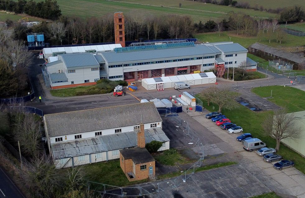 File photo dated 20/01/22 of part of the Manston immigration short-term holding facility located at the former Defence Fire Training and Development Centre in Thanet, Kent. Channel migrants are being held for up to a week in a new processing centre which is %22struggling%22 to cope with the influx of people, a union which represents Border Force officers warned. Issue date: Thursday October 6, 2022.