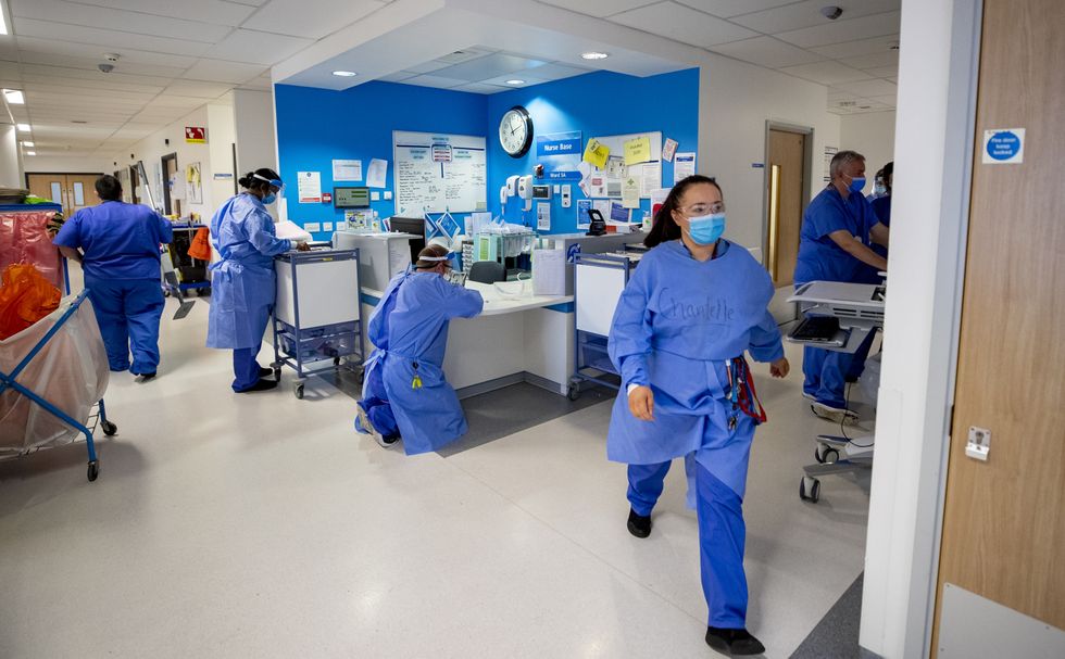 File photo dated 20/10/20 of staff on a hospital ward. Health unions are calling for an inflation-busting pay rise to tackle the NHS staffing crisis and increasing waiting times for treatment. Issue date: Monday January 24, 2022.
