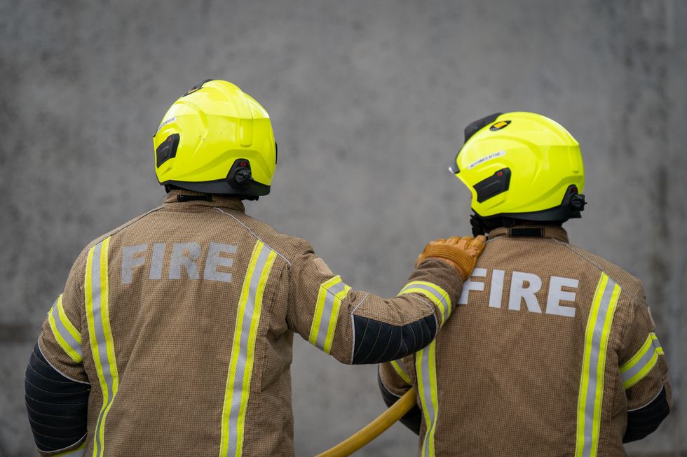 File photo dated 21/07/22 of New London Fire Brigade recruits go through their paces during a drill at a Fire station in East London. Firefighters say they have been left with %22no choice%22 as they prepare to take their fight pay rise fight to the Scottish Parliament this week. It is set to be the biggest demonstration in years from the service as hundreds of firefighters and supporters take the Fire Brigade Union's (FBU) campaign to Holyrood. Issue date: Sunday October 23, 2022.